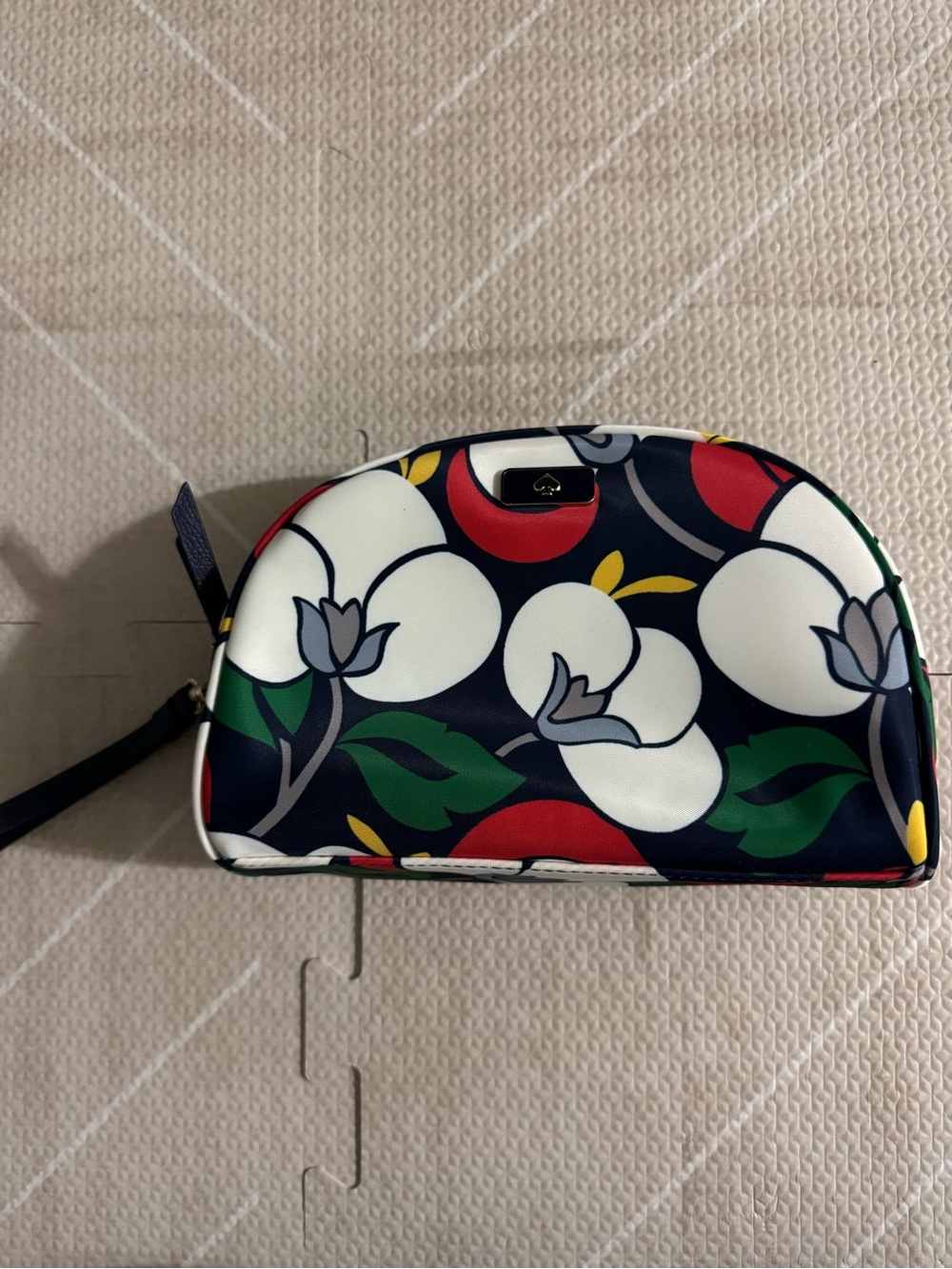 kate spade Navy Floral Dome Cosmetic Wristlet with Red, White & Green Print